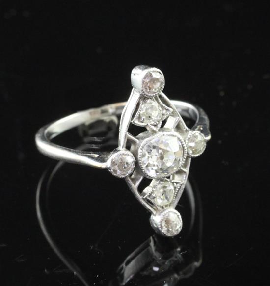 A white gold and diamond cluster ring, size O.